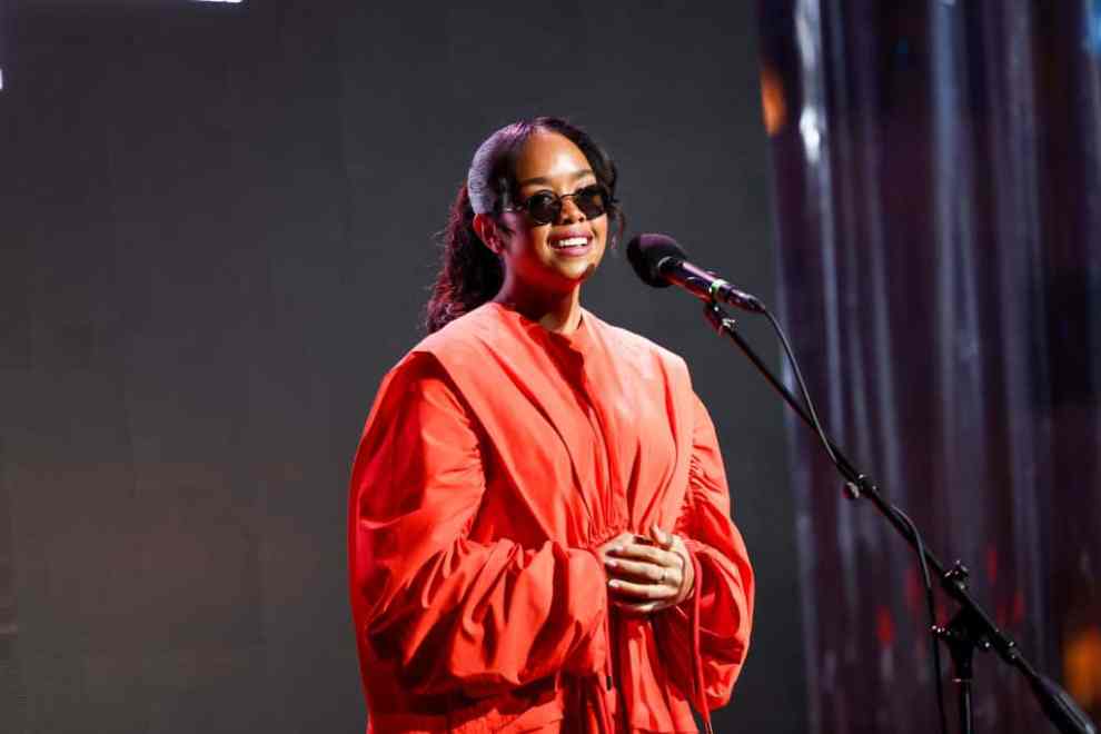 H.E.R. speaks onstage during the Get Lit-Words Ignite Gala Honoring H.E.R. at The GRAMMY Museum on December 11, 2022 in Los Angeles, California.