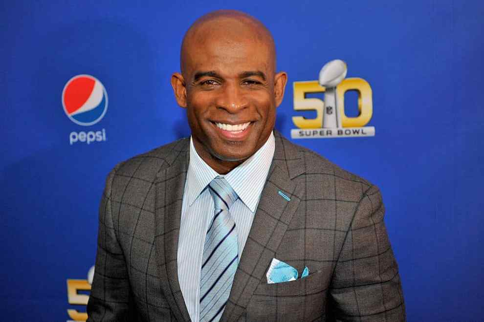 SAN FRANCISCO, CA - FEBRUARY 05: TV personality/retired NFL player Deion Sanders walks the Blue Carpet at the 2015 Pepsi Rookie of the Year Award Ceremony at Pepsi Super Friday Night at Pier 70 on February 5, 2016 in San Francisco, California.