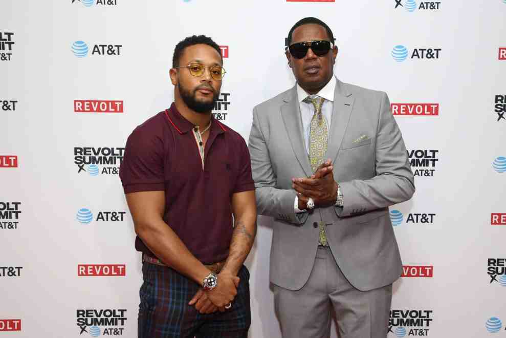 Romeo and Master P pose at Revolt Summit