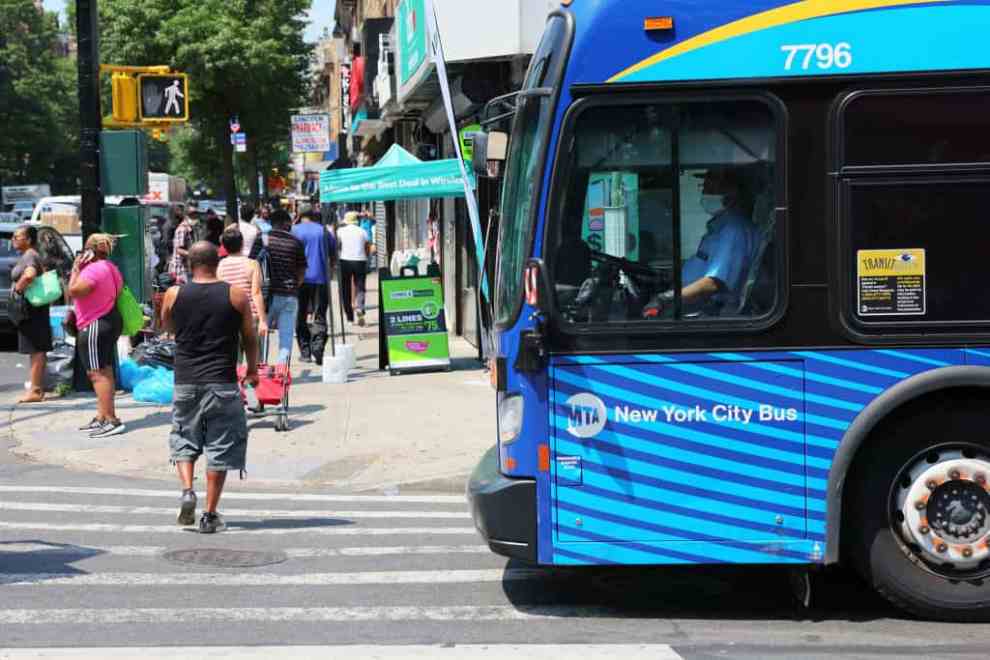 NEW YORK, NEW YORK - JULY 22: An MTA bus driver waits to turn into Flatbush Avenue on July 22, 2022 in the Flatbush neighborhood of the Brooklyn borough in New York City. A heat advisory is in effect in the city and is expected to last through the weekend, with Sunday expected to see a high of 98 degrees, which could break NYC’s record of 97 that was set in Central Park in 2010.