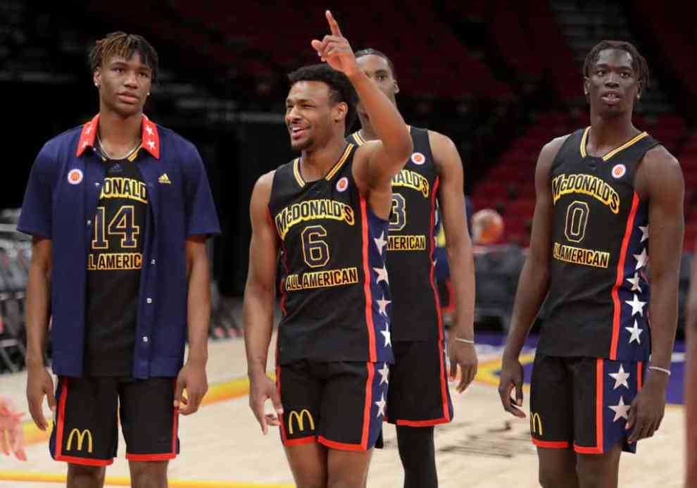 HOUSTON, TEXAS - MARCH 28: Bronny James (C) and players attend the 46th Annual McDonalds All American Games with Halftime Performance by Don Toliver on March 28, 2023 in Houston, Texas.