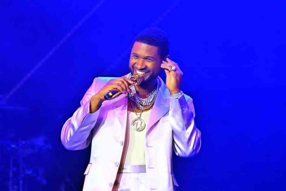 ATLANTA, GEORGIA - MAY 07: Usher performs during the Strength Of A Woman Festival & Summit State Farm Arena Concert at State Farm Arena on May 07, 2022 in Atlanta, Georgia