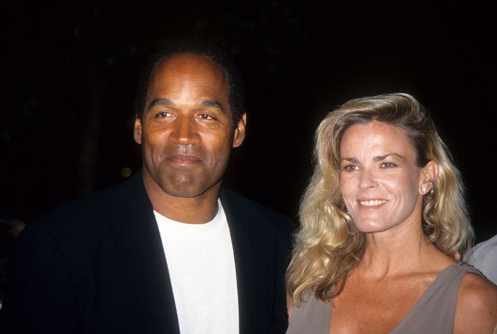 LOS ANGELES - MARCH 16: O.J. Simpson and Nicole Brown Simpson pose at the premiere of the "Naked Gun 33 1/3: The Final Isult" in which O.J. starred on March 16, 1994 in Los Angeles, California.