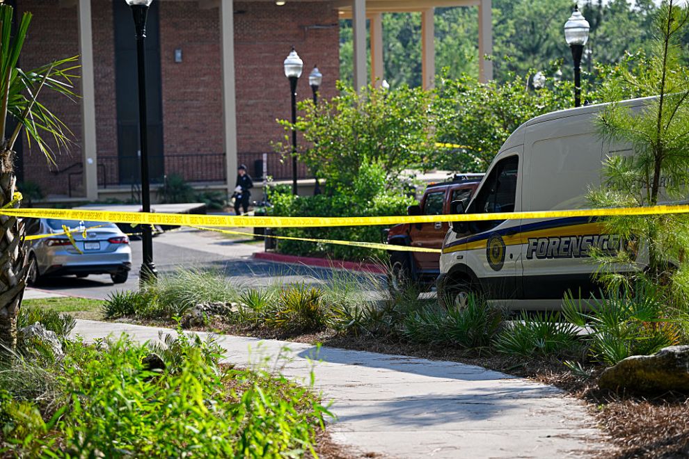 TALLAHASSEE, FLORIDA - APRIL 17: Police tape surrounds the scene of a shooting near the student union at Florida State University on April 17, 2025 in Tallahassee, Florida. At least two people were killed and several others were injured when the alleged shooter, believed to be a current student and the son of a Leon County sheriff's deputy, opened fire on the university's main campus.