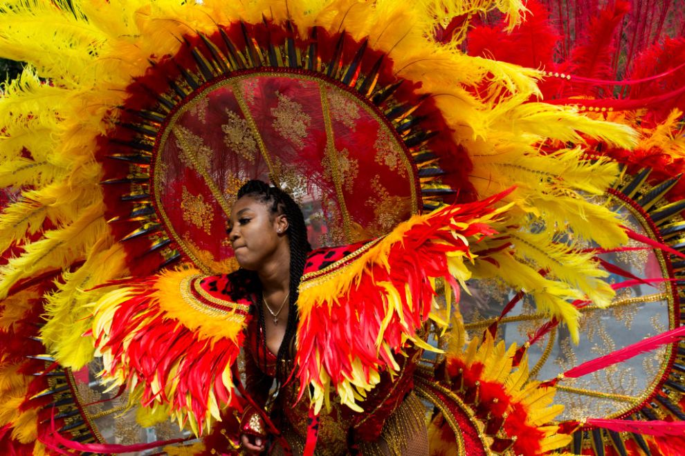 A masquerader performs during the 52nd annual West Indian Day Parade Monday September 2, 2019 in the Crown Heights neighborhood of Brooklyn, NY. The parade experienced heavy downpours as the Caribbean was simultaneously being hit by Tropical Storm Dorian.