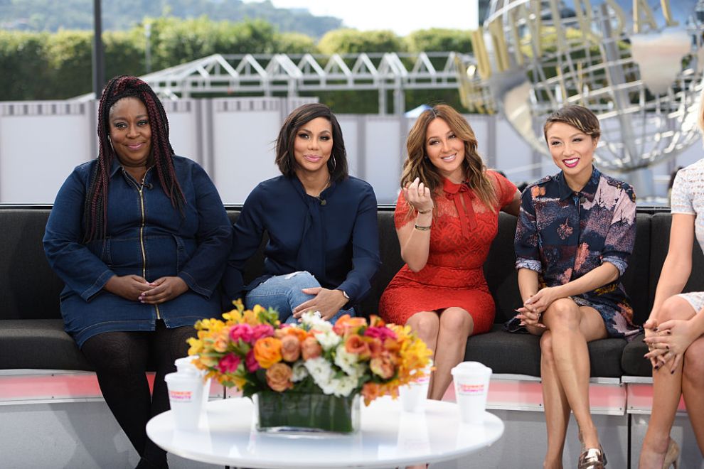 Loni Love, Tamar Braxton, Adrienne Bailon and Jeannie Mai of "The Real" visit "Extra" at Universal Studios Hollywood on February 25, 2016 in Universal City, California.