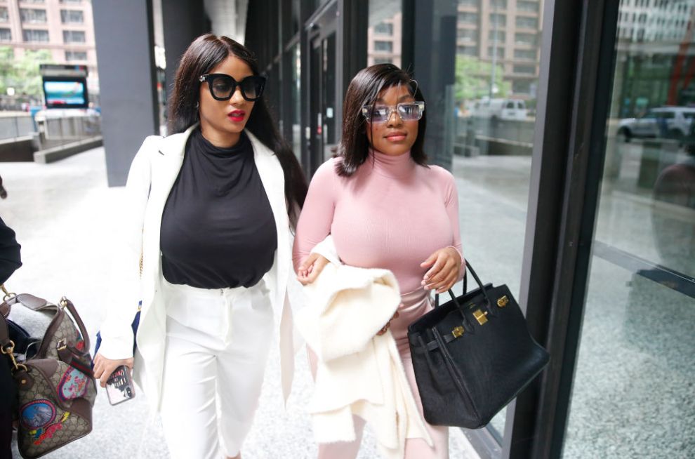 CHICAGO, ILLINOIS - JULY 16: Supporters of singer R. Kelly, Azriel Clary and Joycelyn Savage, leave after the singer's arraignment at the Dirksen Federal Building on July 16, 2019 in Chicago, Illinois.