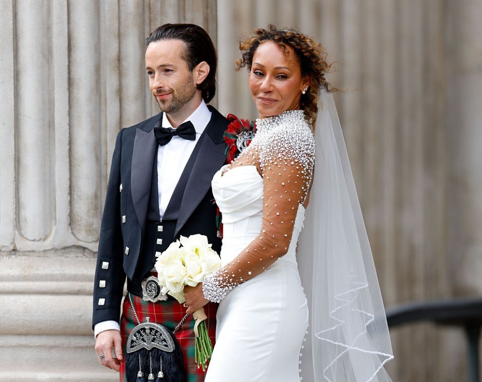 LONDON, UNITED KINGDOM - JULY 05: (EMBARGOED FOR PUBLICATION IN UK NEWSPAPERS UNTIL 24 HOURS AFTER CREATE DATE AND TIME) Rory McPhee and Mel B depart following their wedding in the OBE (Order of the British Empire) Chapel at St Paul's Cathedral on July 5, 2025 in London, England